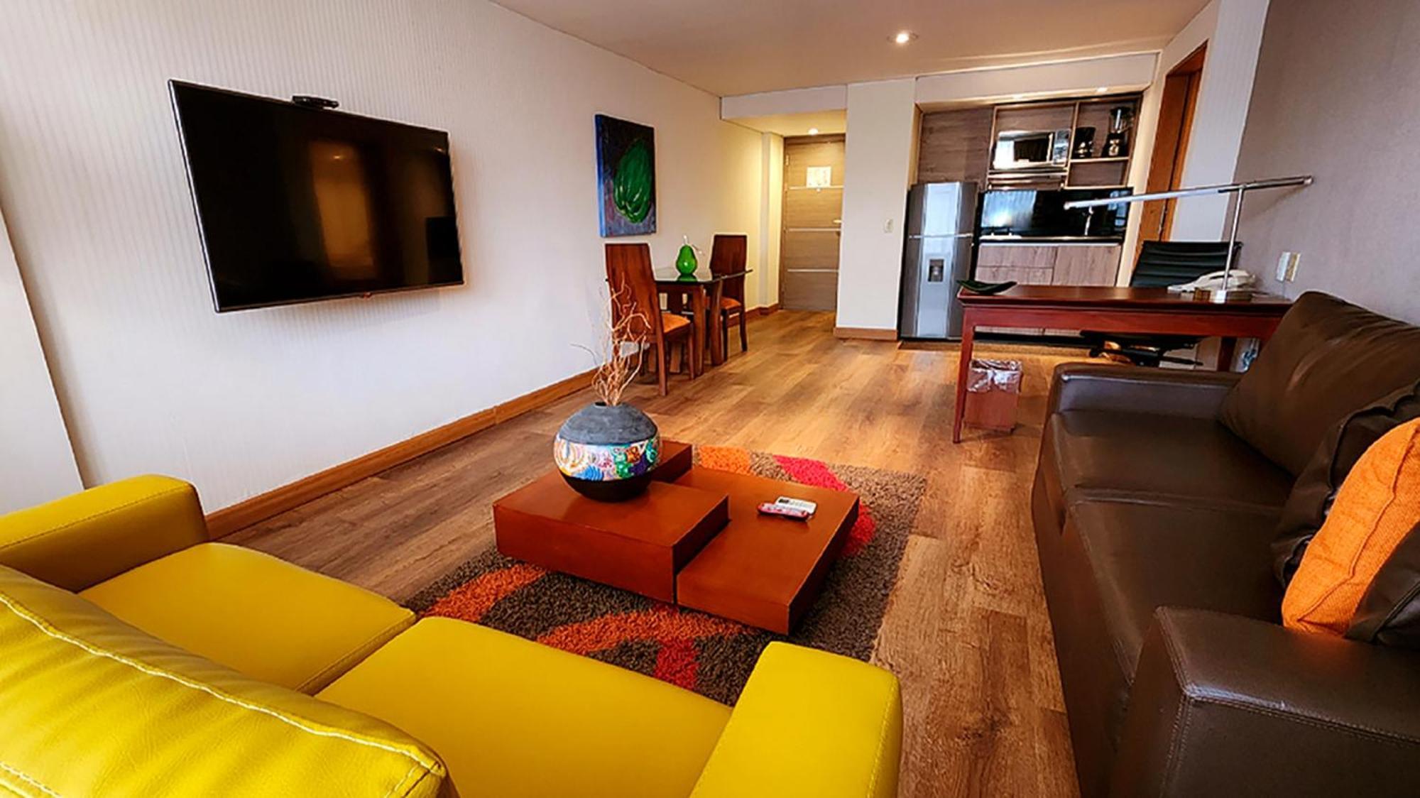 Bogota Plaza Hotel ภายนอก รูปภาพ A living room in a serviced apartment in Lima, Peru